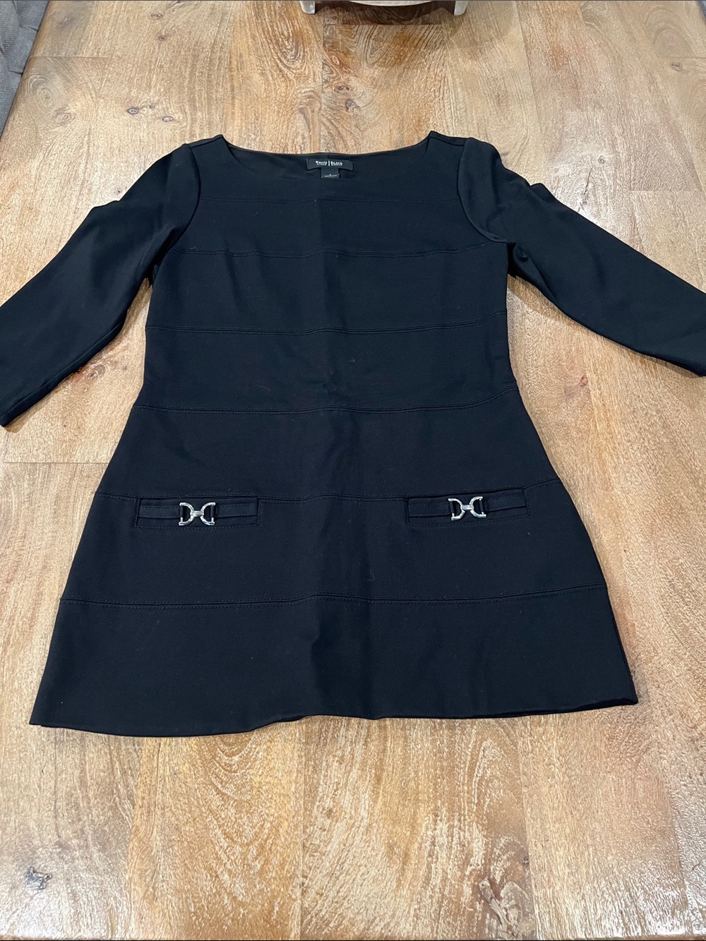White House Black Market black fitted tunic with Silver Buckle accent